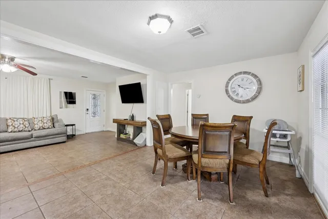 a view of a livingroom with furniture and a window
