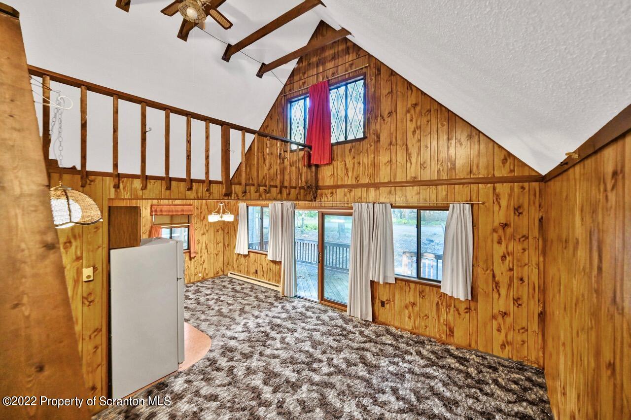 1038 Beaver Run Road Newfoundland, PA 18445 - Photo 20 of 34 a front view of a house with a yard