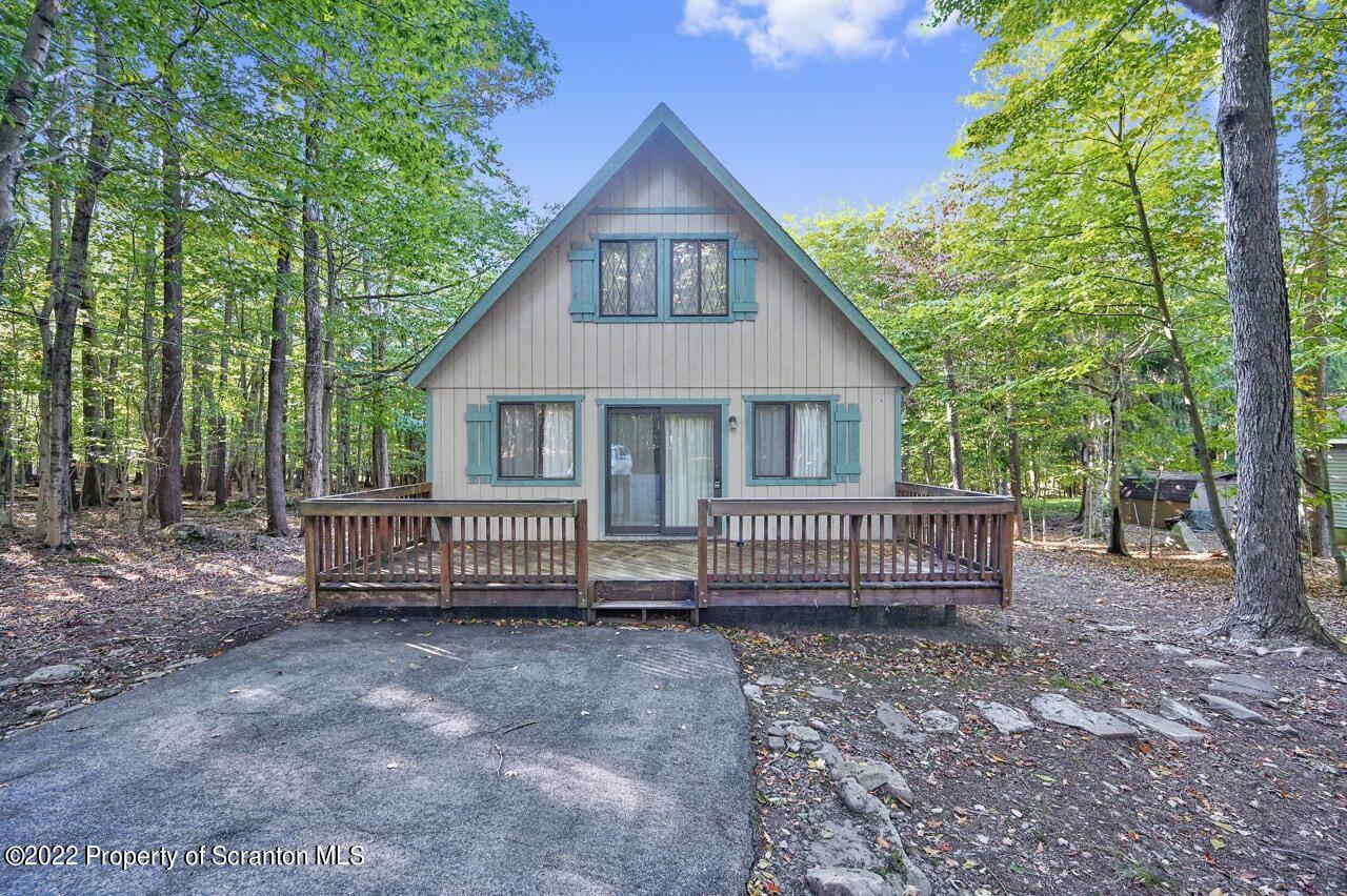 1038 Beaver Run Road Newfoundland, PA 18445 - Photo 2 of 34 a view of a house with a yard and wooden fence