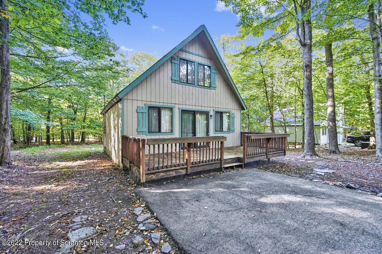 1038 Beaver Run Road Newfoundland, PA 18445 - Photo 4 of 34 a view of a house with a yard and deck