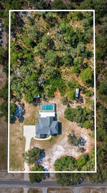 15420 Aubrey Avenue Spring Hill, FL 34610 - Photo 2 of 28 a view of a outdoor space