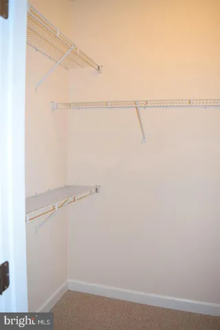 a view of small space with racks on the wall