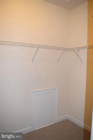 a view of small space with racks on the wall