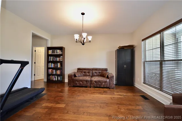 a view of a livingroom with furniture and window