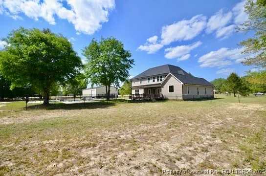 a house view with a garden space