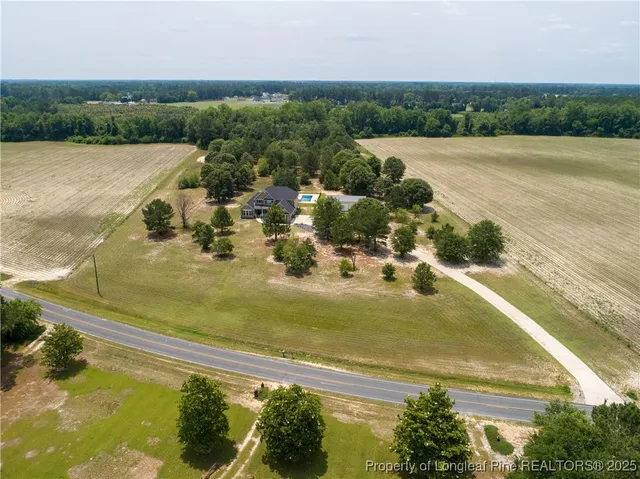 a view of a lake with a yard