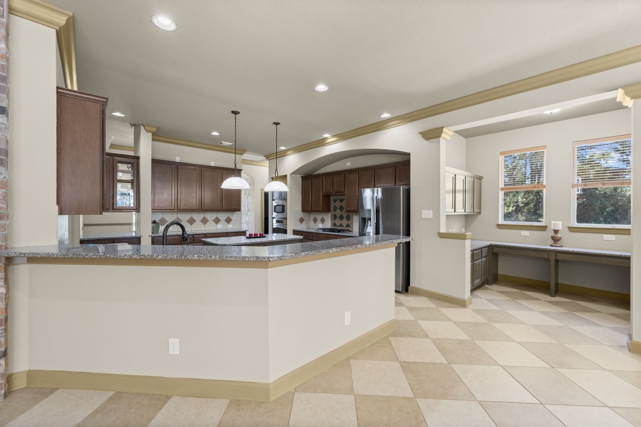 1534 Virgie Community Road Magnolia, TX 77354 - Photo 50 of 50 The majestic and large kitchen inside your new home has everything a top chef would need including tremendous counter space. The floorplan and lines of this home flow so perfectly throughout.
