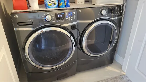 a utility room with dryer and washer