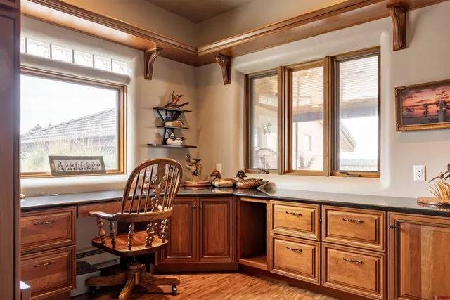 a view of a chair and table in a livingroom