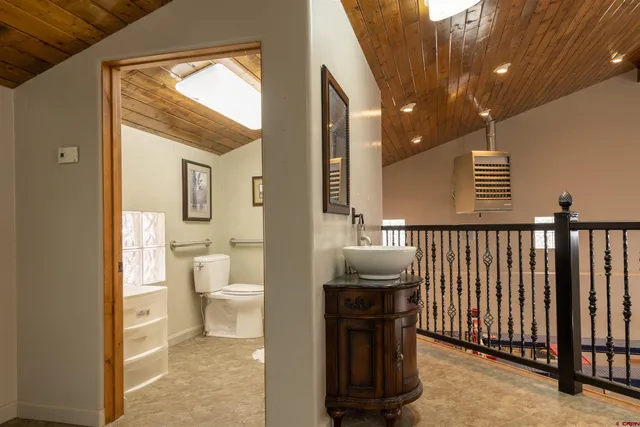 a bathroom with a sink and a toilet