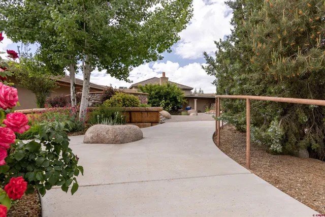 a bedroom with a bed and a chair