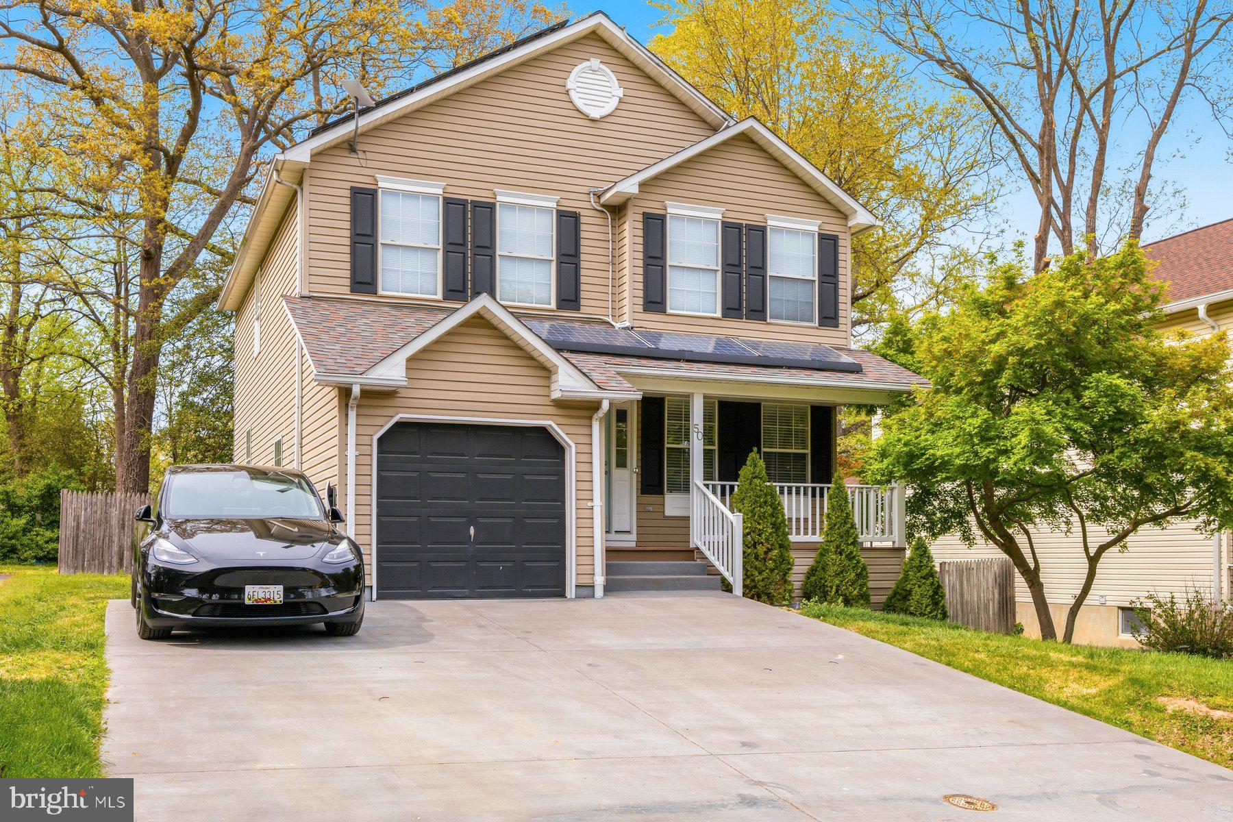 a view of a car park in front of house