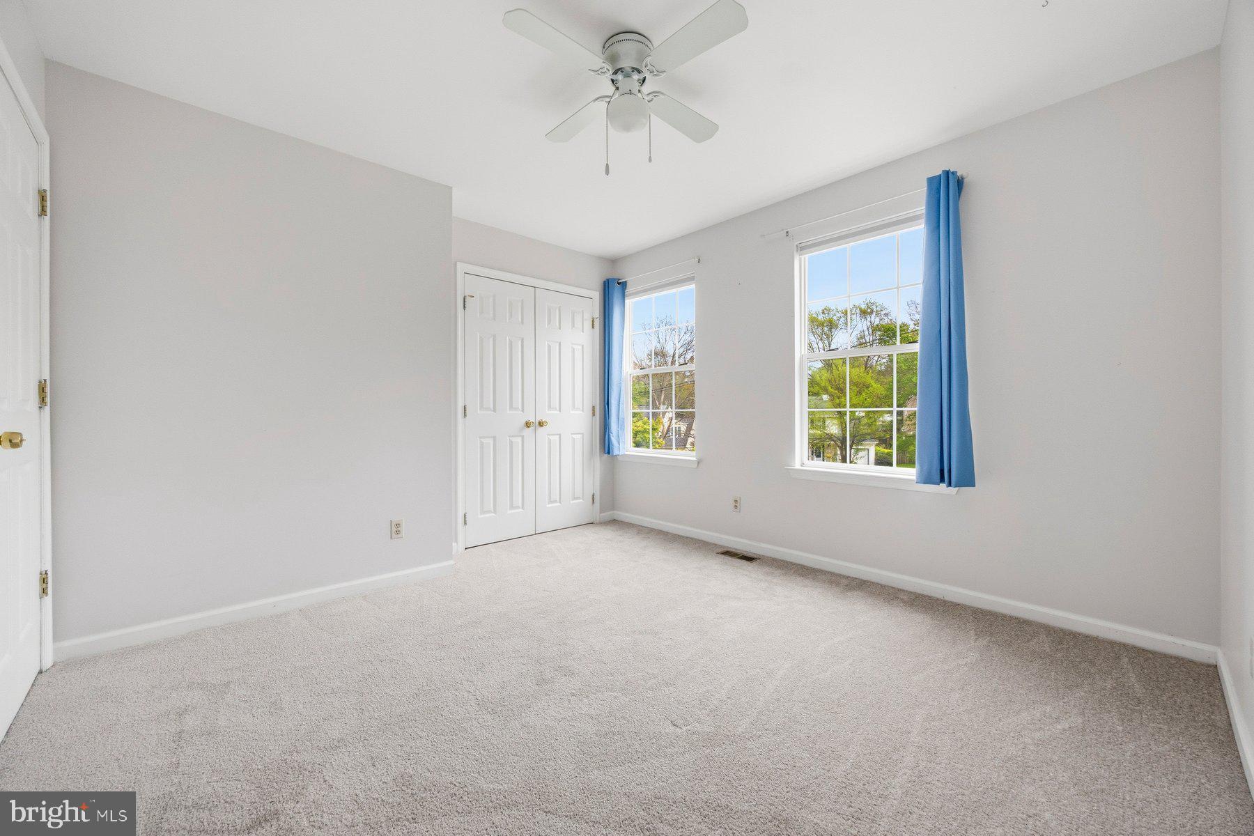 50 Robinson Landing Road Severna Park, MD 21146 - Photo 22 of 38 an empty room with windows and closet
