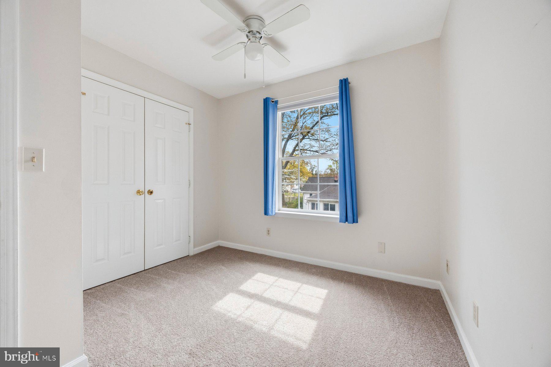 50 Robinson Landing Road Severna Park, MD 21146 - Photo 24 of 38 an empty room with windows and closet