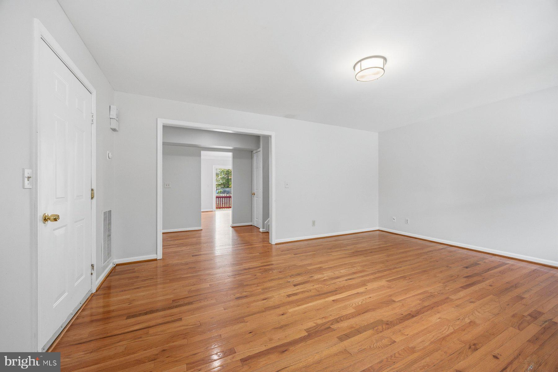 50 Robinson Landing Road Severna Park, MD 21146 - Photo 3 of 38 a view of an empty room and wooden floor