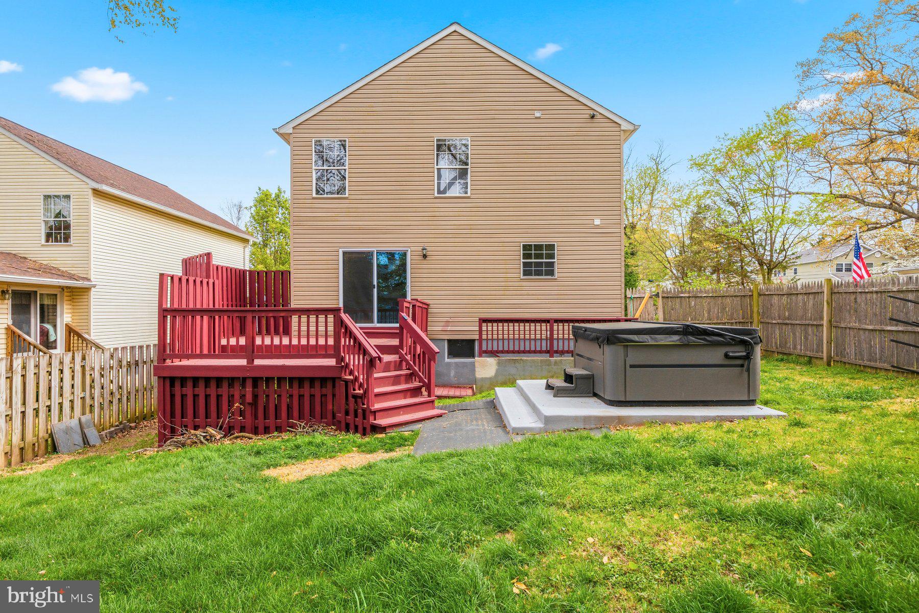 50 Robinson Landing Road Severna Park, MD 21146 - Photo 38 of 38 a backyard of a house with fire pit and chairs