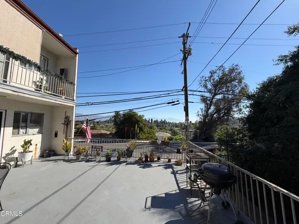 a view of house with outdoor space and porch