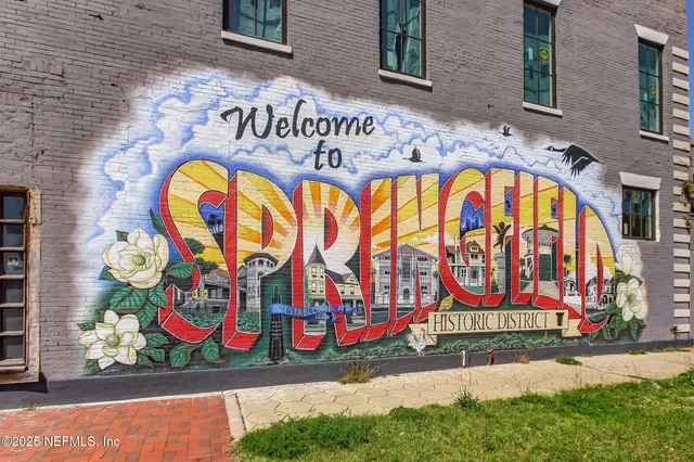 a view of a building on a street