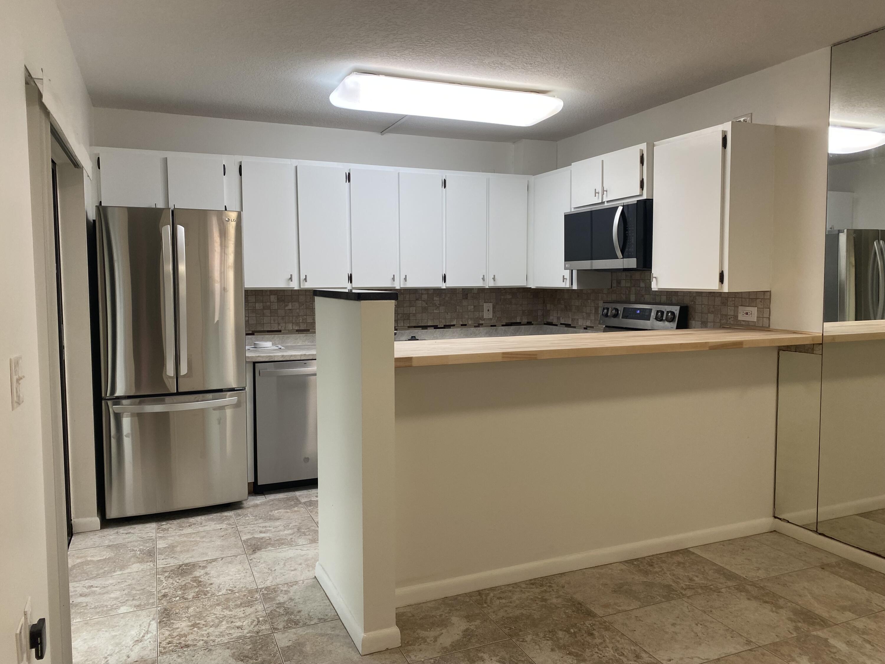 1607 16th Lane Palm Beach Gardens, FL 33418 - Photo 8 of 20 IMG_9129