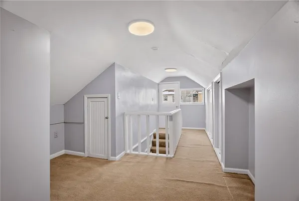 a view of a livingroom with a staircase