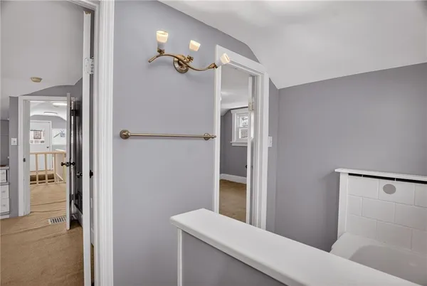 a bathroom with a sink and toilet