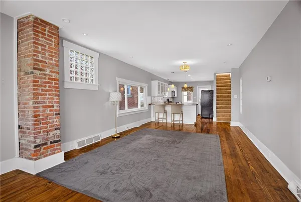 a view of livingroom with hardwood and furniture