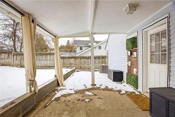 a view of a porch with a backyard