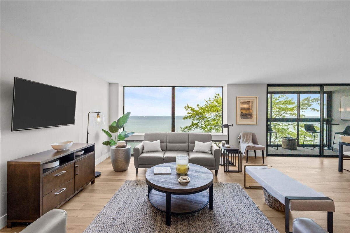 1500 Sheridan Road, Unit 3I Wilmette, IL 60091 - Photo 14 of 37 a living room with furniture a flat screen tv and a large window
