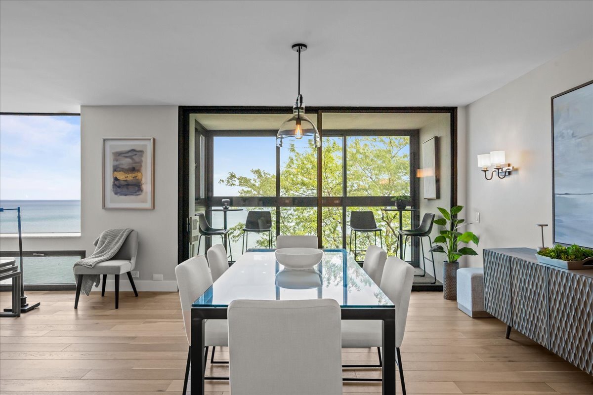 1500 Sheridan Road, Unit 3I Wilmette, IL 60091 - Photo 16 of 37 a dining room with furniture window wooden floor