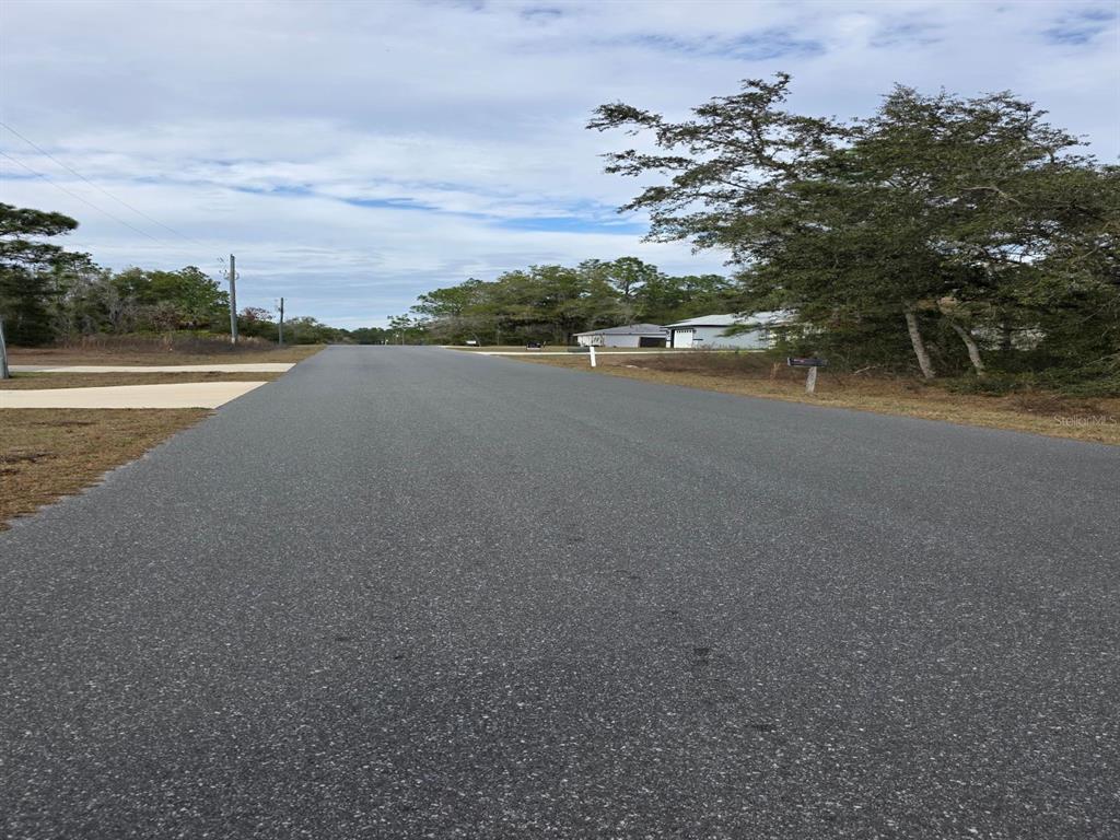 Southwest 140th Court Ocala, FL 34481 - Photo 3 of 5 a view of a lake