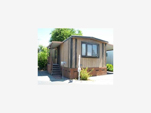 2150 Monterey Road, Unit 160 San Jose, CA 95112 - Photo 1 of 1 a front view of a house with a yard