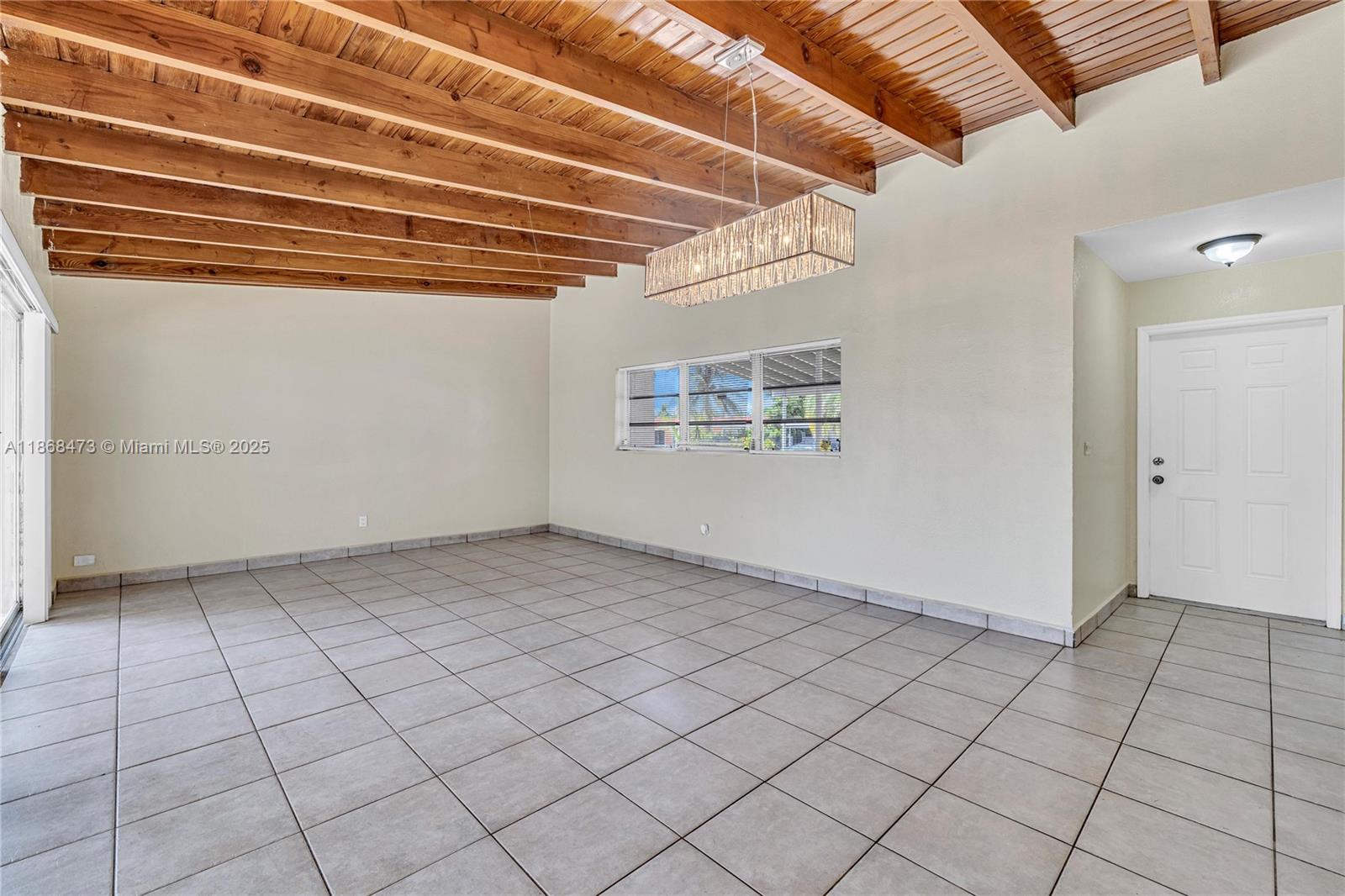 650 Northeast 178th Street Miami, FL 33162 - Photo 3 of 37 a view of an empty room