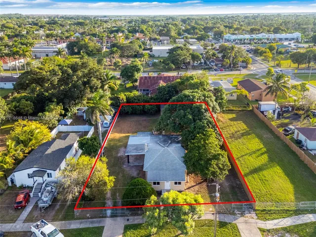 a view of a hallway with an outdoor space