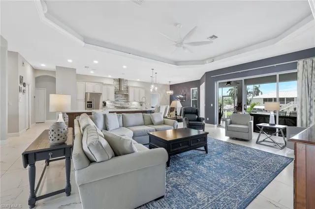 a living room with furniture and a table