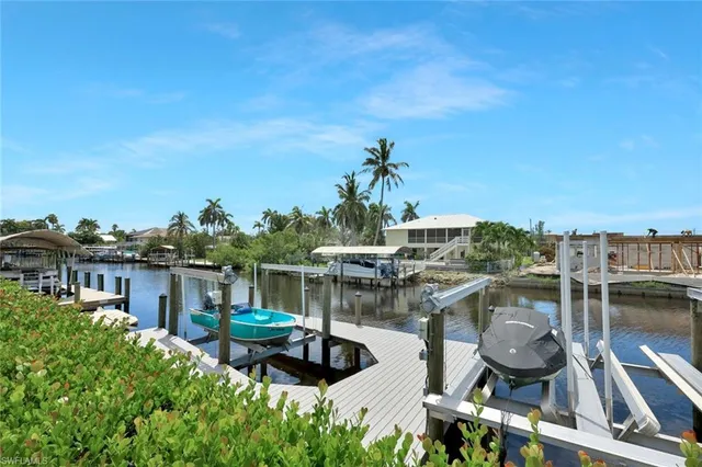 a view of a lake with sitting area