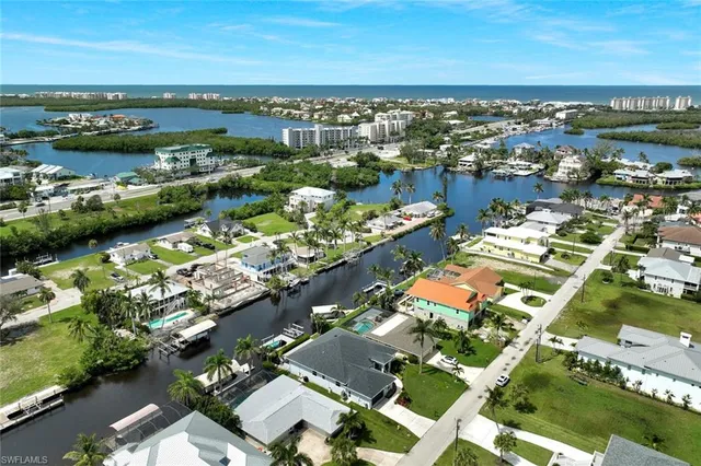 an aerial view of city and lake view