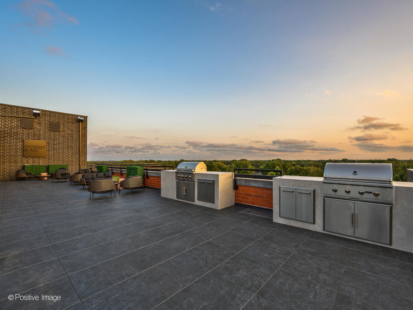 11 West Prospect Avenue, Unit 515 Mount Prospect, IL 60056 - Photo 32 of 43 a view of a terrace with a barbeque