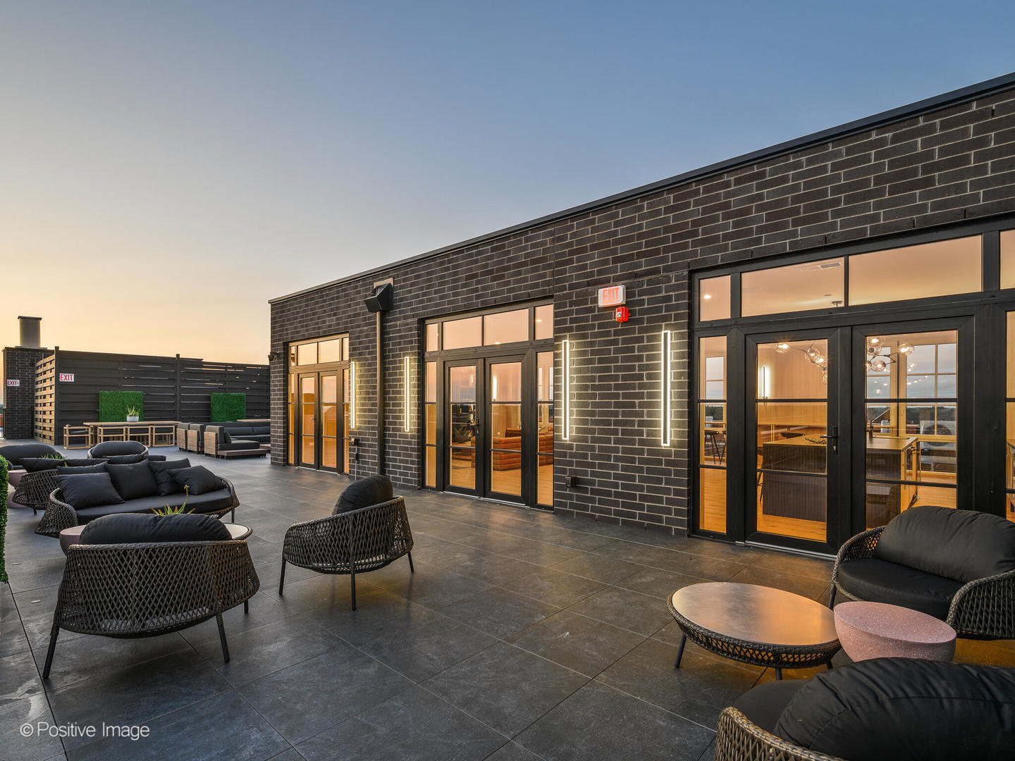 11 West Prospect Avenue, Unit 515 Mount Prospect, IL 60056 - Photo 42 of 43 a living room with furniture and a floor to ceiling window