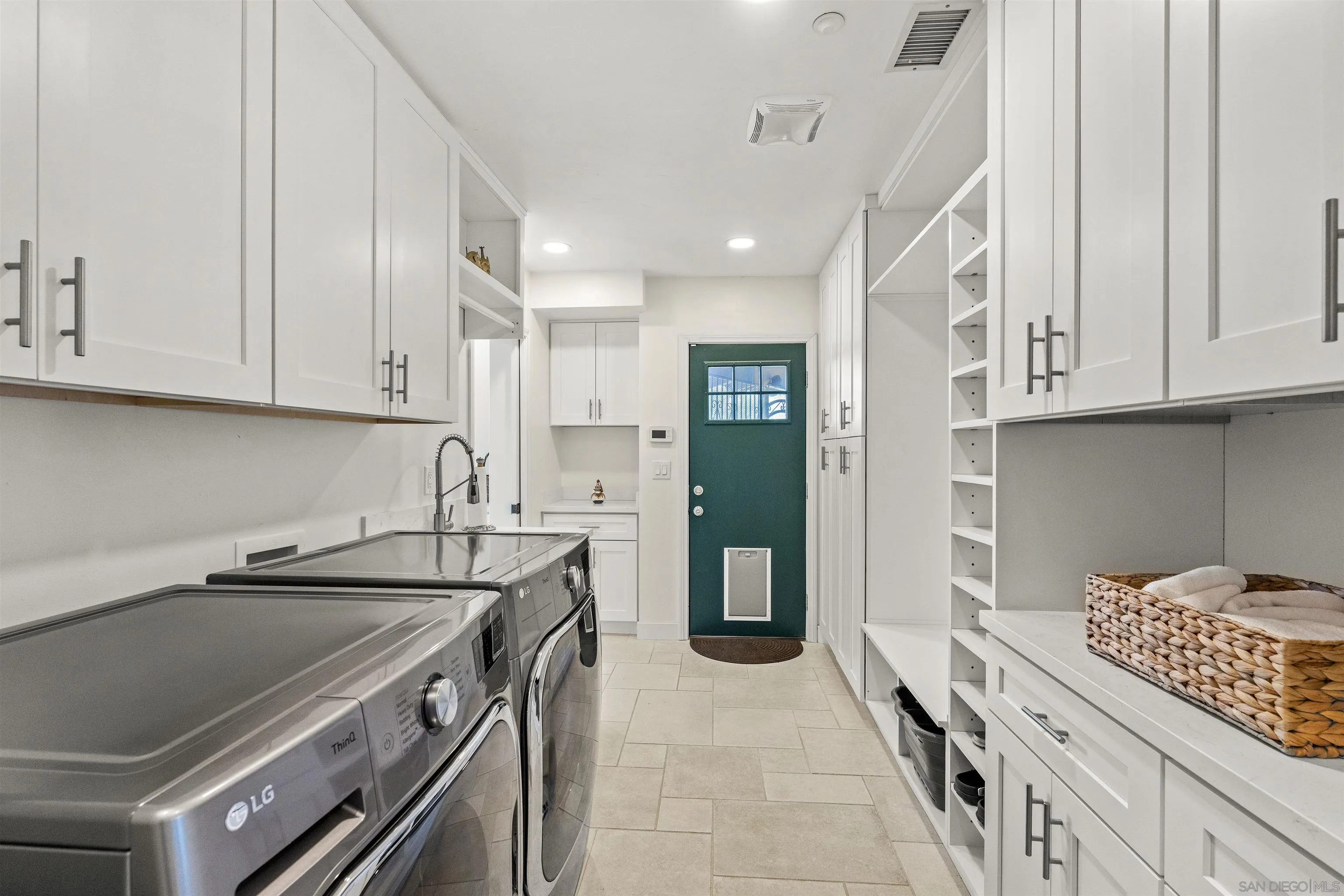 30659 Diaz Road Valley Center, CA 92082 - Photo 32 of 44 a kitchen that has a sink and a stove