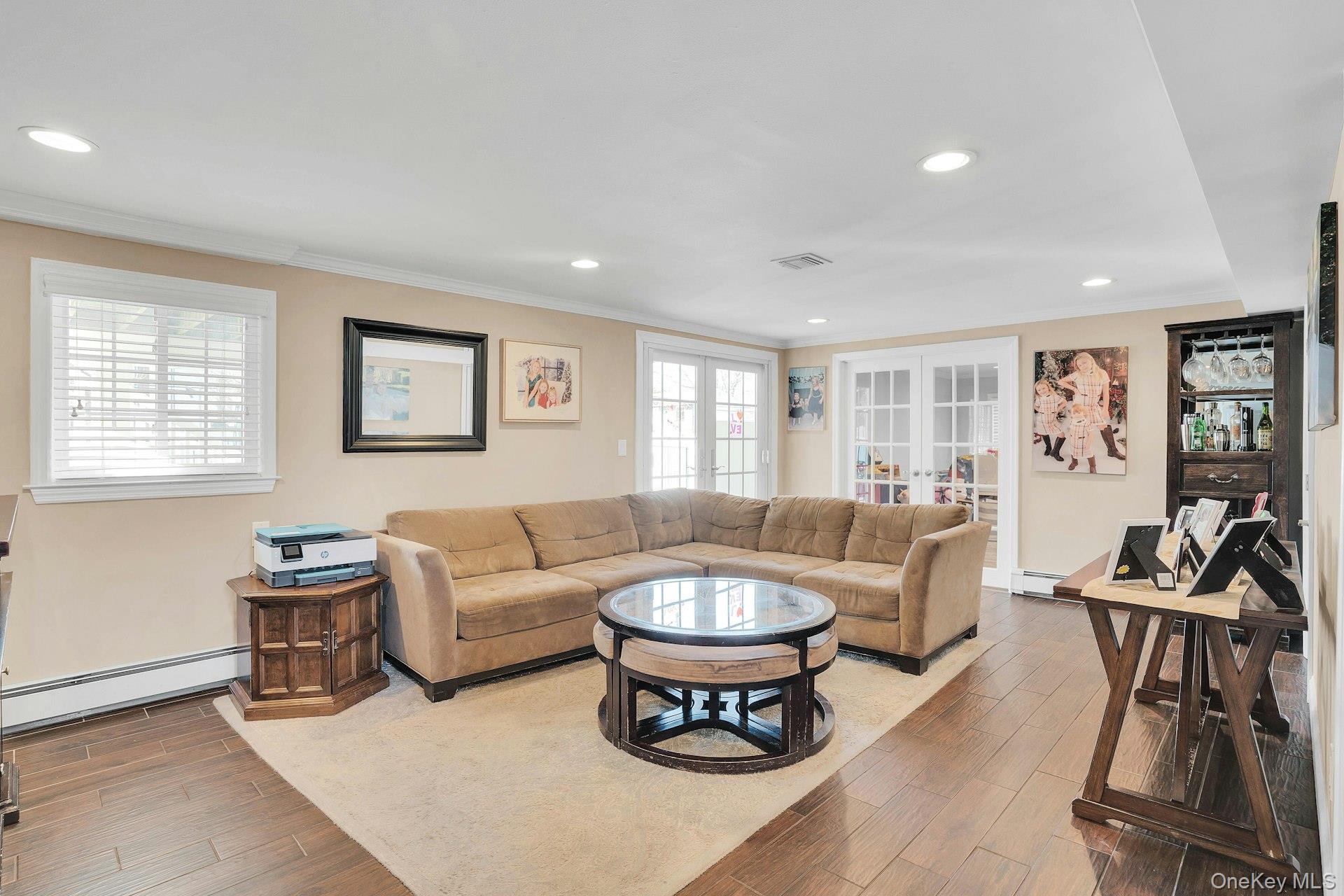 108 Hayrick Lane Commack, NY 11725 - Photo 19 of 50 a living room with furniture a rug and a window