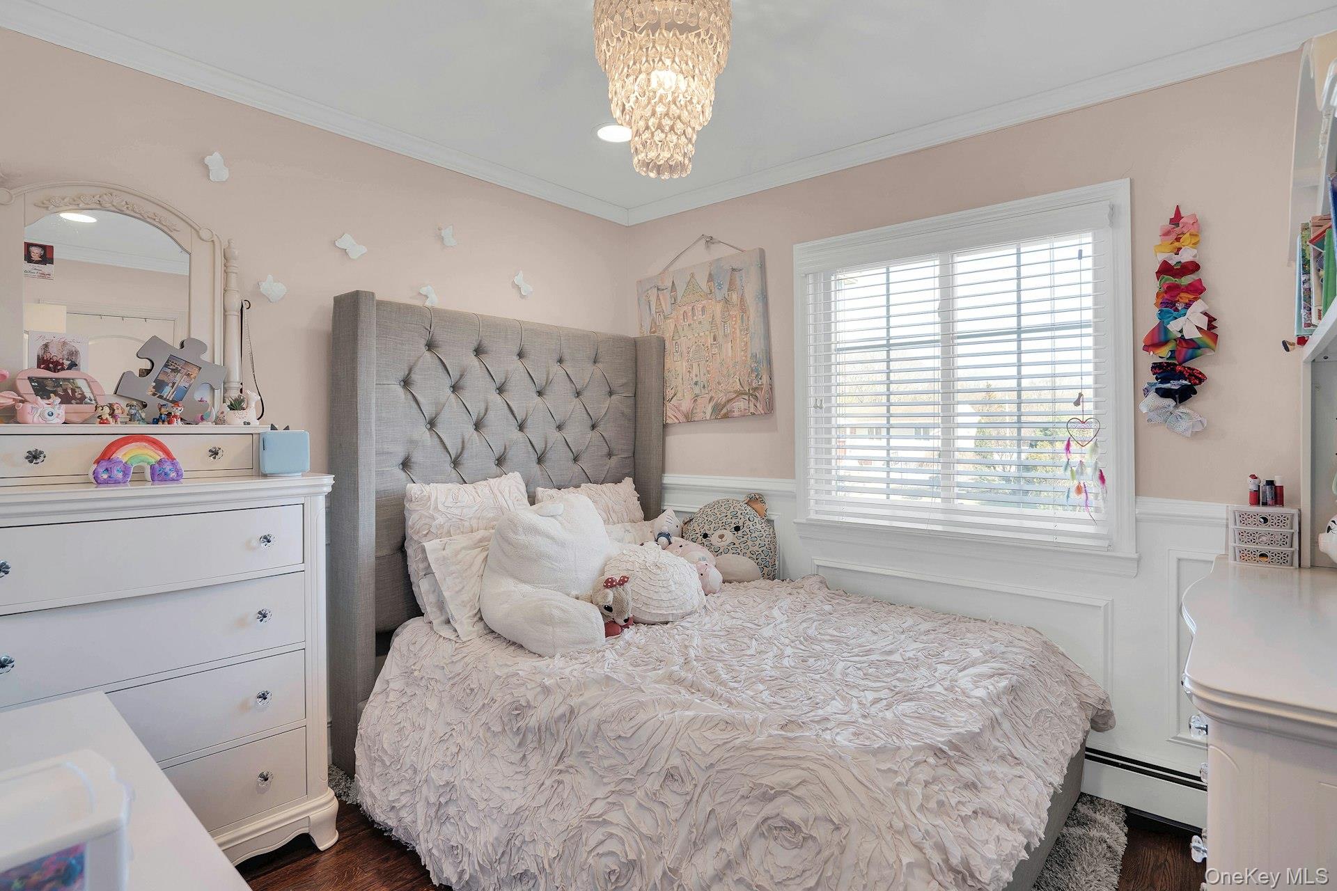 108 Hayrick Lane Commack, NY 11725 - Photo 35 of 50 a bedroom with a bed and a window