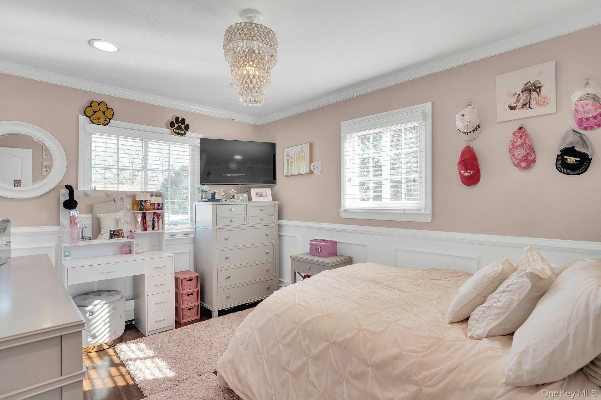 108 Hayrick Lane Commack, NY 11725 - Photo 36 of 50 a bedroom with a bed dresser and flat screen tv