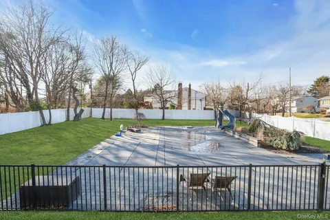 a view of swimming pool from a balcony