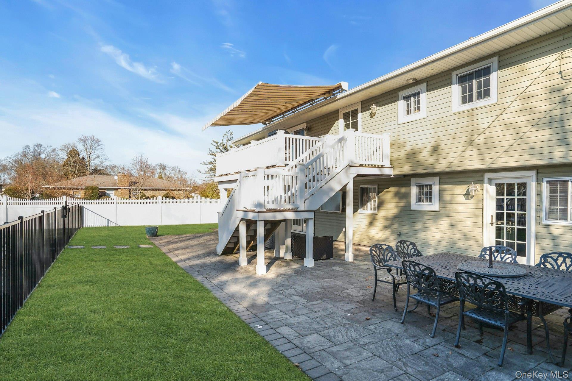 108 Hayrick Lane Commack, NY 11725 - Photo 42 of 50 a view of a house with yard and sitting area