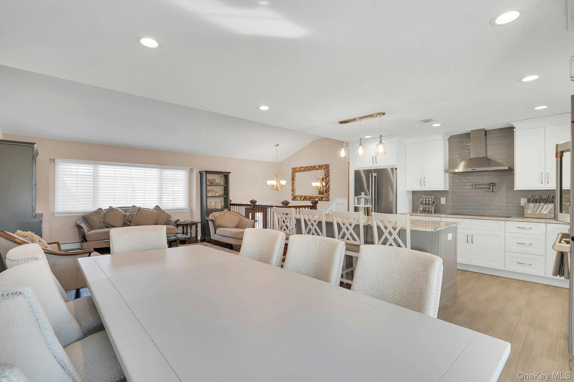 108 Hayrick Lane Commack, NY 11725 - Photo 9 of 50 a large white kitchen with a large window