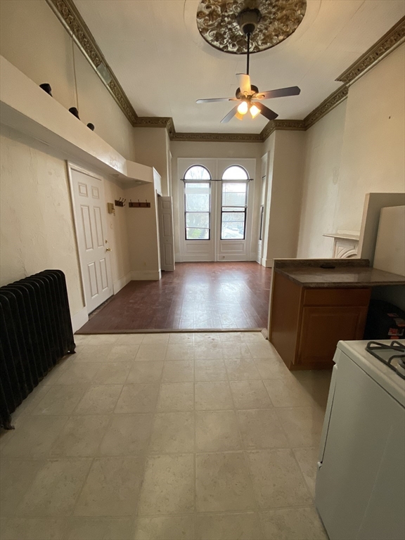 14 Monument Square, Unit 11 Boston, MA 02129 - Photo 2 of 4 a view of a livingroom with a chandelier