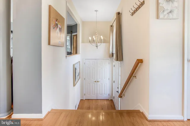 a front view of a house with plants