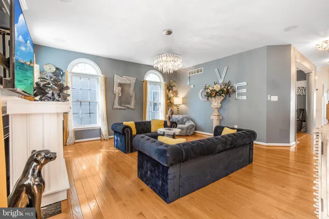 a view of room with window and ceiling fan