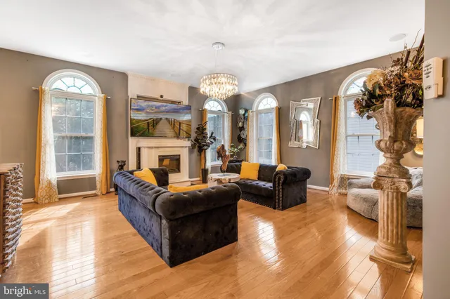 a view of a livingroom with wooden floor
