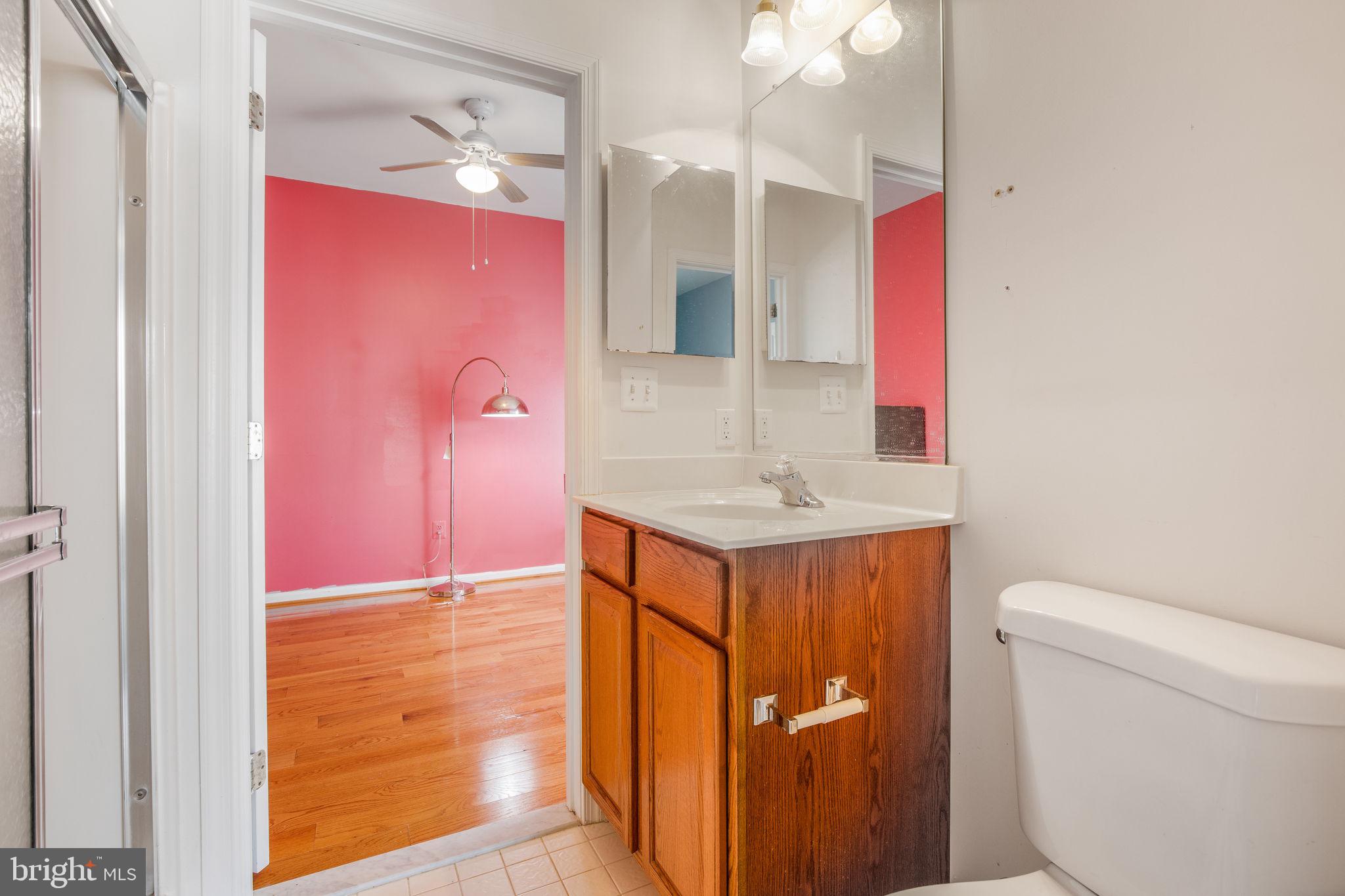 10 Fallston View Court Fallston, MD 21047 - Photo 47 of 89 a bathroom with a sink a toilet and a mirror